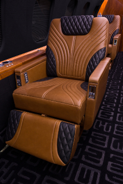 The seat design combines brown and black leather