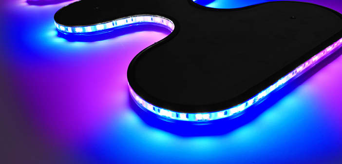 Flexible LED lighting strip with blue and purple light sections