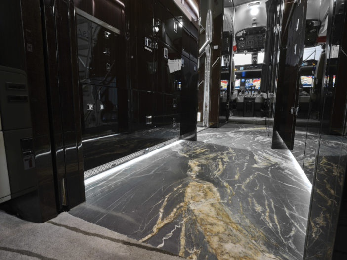 Stone flooring in business jet gallery